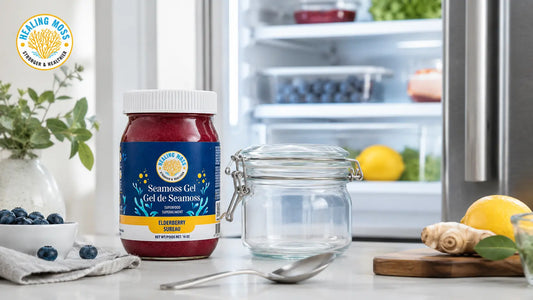Healing Moss Elderberry Sea Moss Gel beside an airtight glass jar and open fridge showing proper refrigerated storage.
